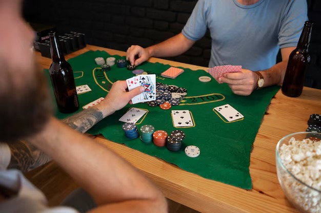 Mobile phone displaying empire slot Mesin Arcade game interface with live dealer